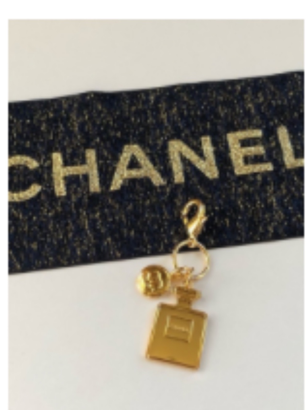 CHANEL Gold-Tone Perfume Bottle Charm with Logo Disc